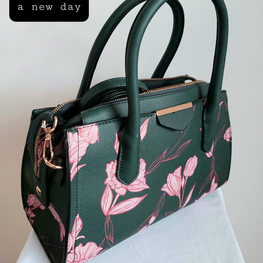 A new day green and pink flowers purse